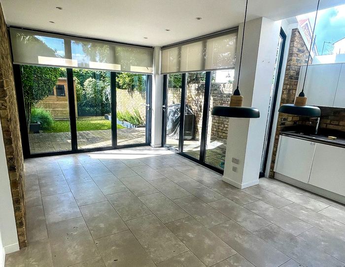 Empty kitchen and dining extension before staging, home staging London